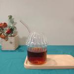 لیوان شیشه‌ ای طرح گنبدی با نی